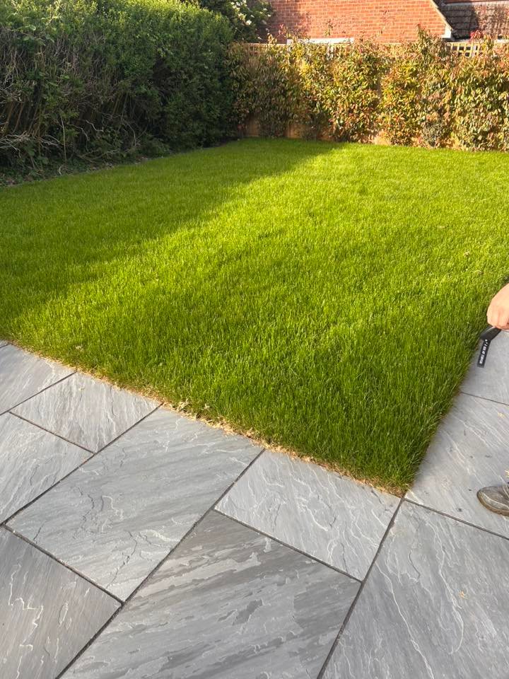 image shows the landscaping round the edge of the garden looking well-kept and clean